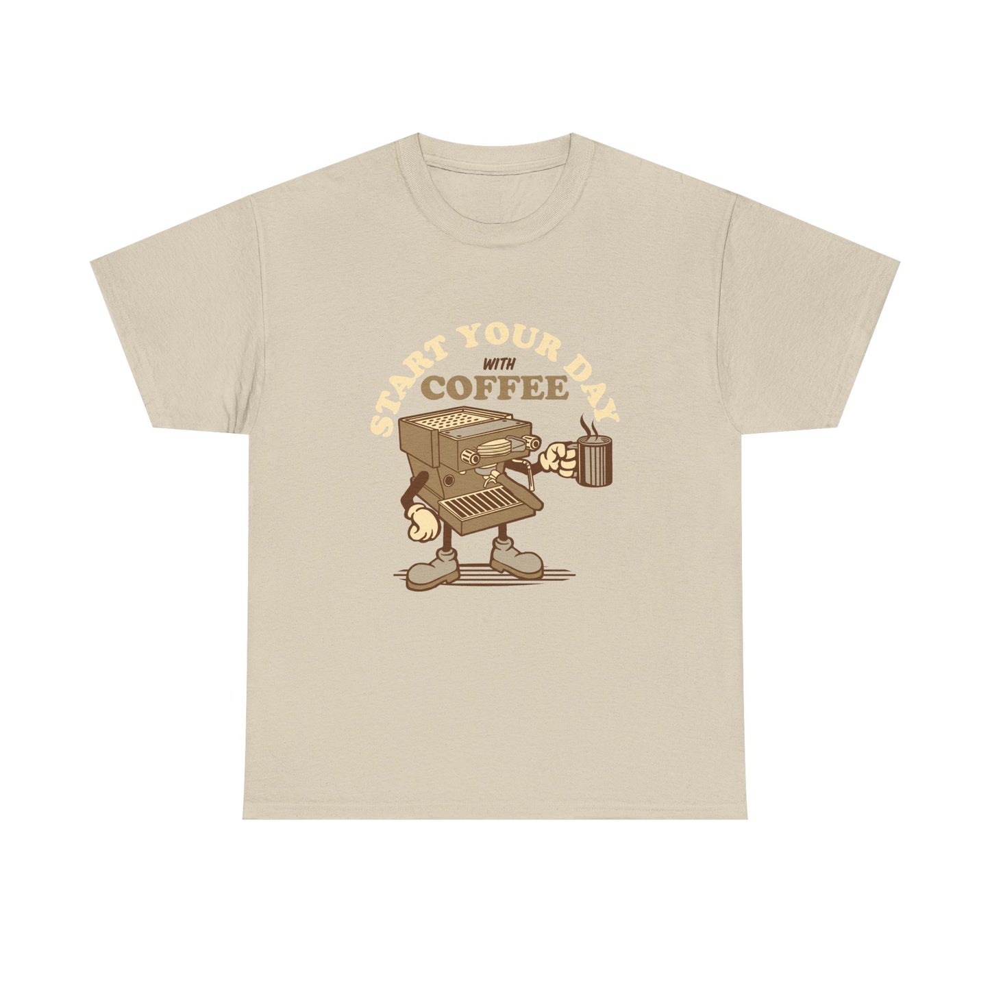 A light beige crewneck t-shirt featuring a cartoon graphic of a coffee maker with legs and arms, holding a mug, with the text 'START YOUR DAY WITH COFFEE' arched above it.