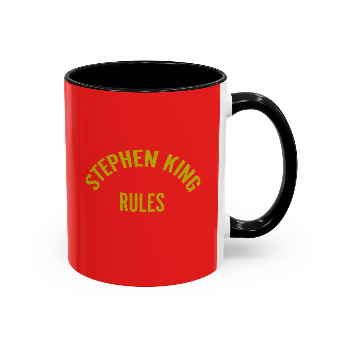 A red ceramic mug with a black handle and black interior, featuring the text 'STEPHEN KING RULES' printed in yellow on the front